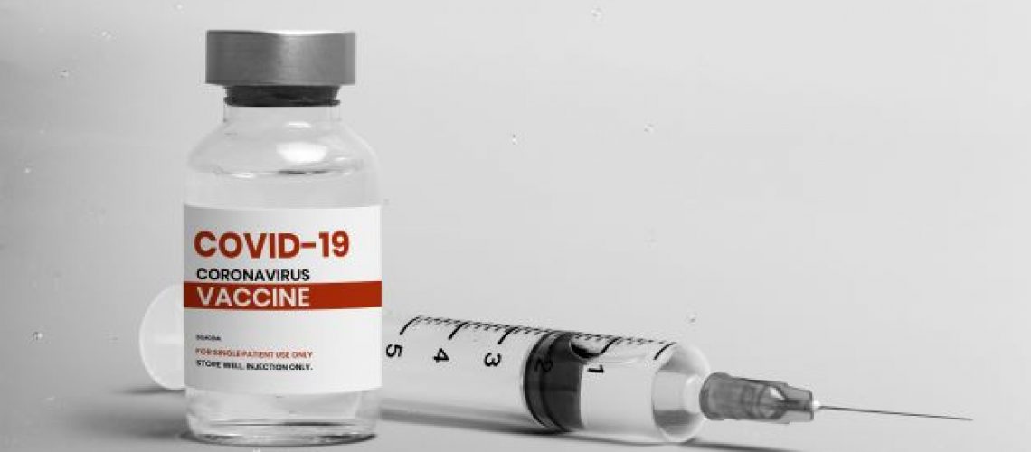 covid-19-vaccine-injection-glass-bottle-with-syringeח